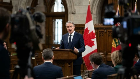 AI-generated official at podium with Canadian flag.