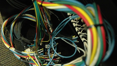 Close-up of multicolored network wires and switches in a Microsoft Redmond equipment area. No people appear.