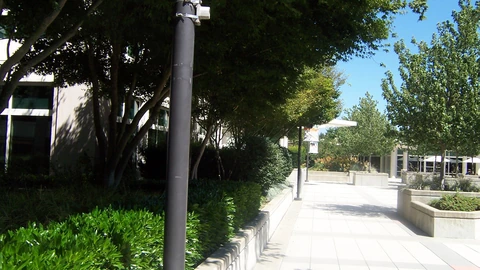 Empty plaza and walkways between Microsoft Redmond campus buildings. No people appear in the frame.