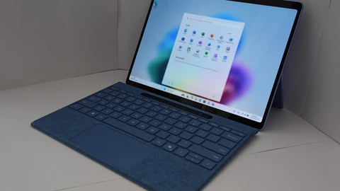 A light blue Windows 11 2-in-1 laptop with Start menu open against a white background. No people appear.