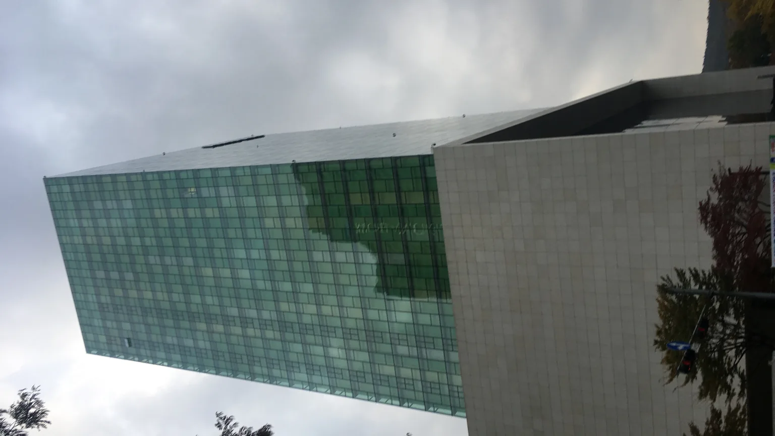 The NAVER Green Factory tower in Seongnam with the NAVER logo on the upper facade.