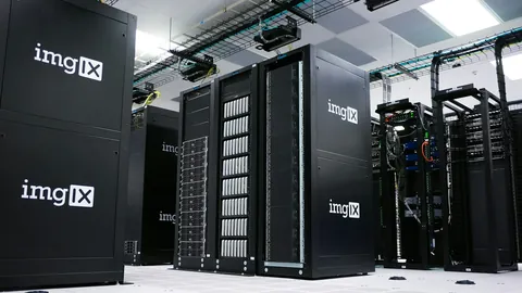 Rows of black server racks in a data centre.