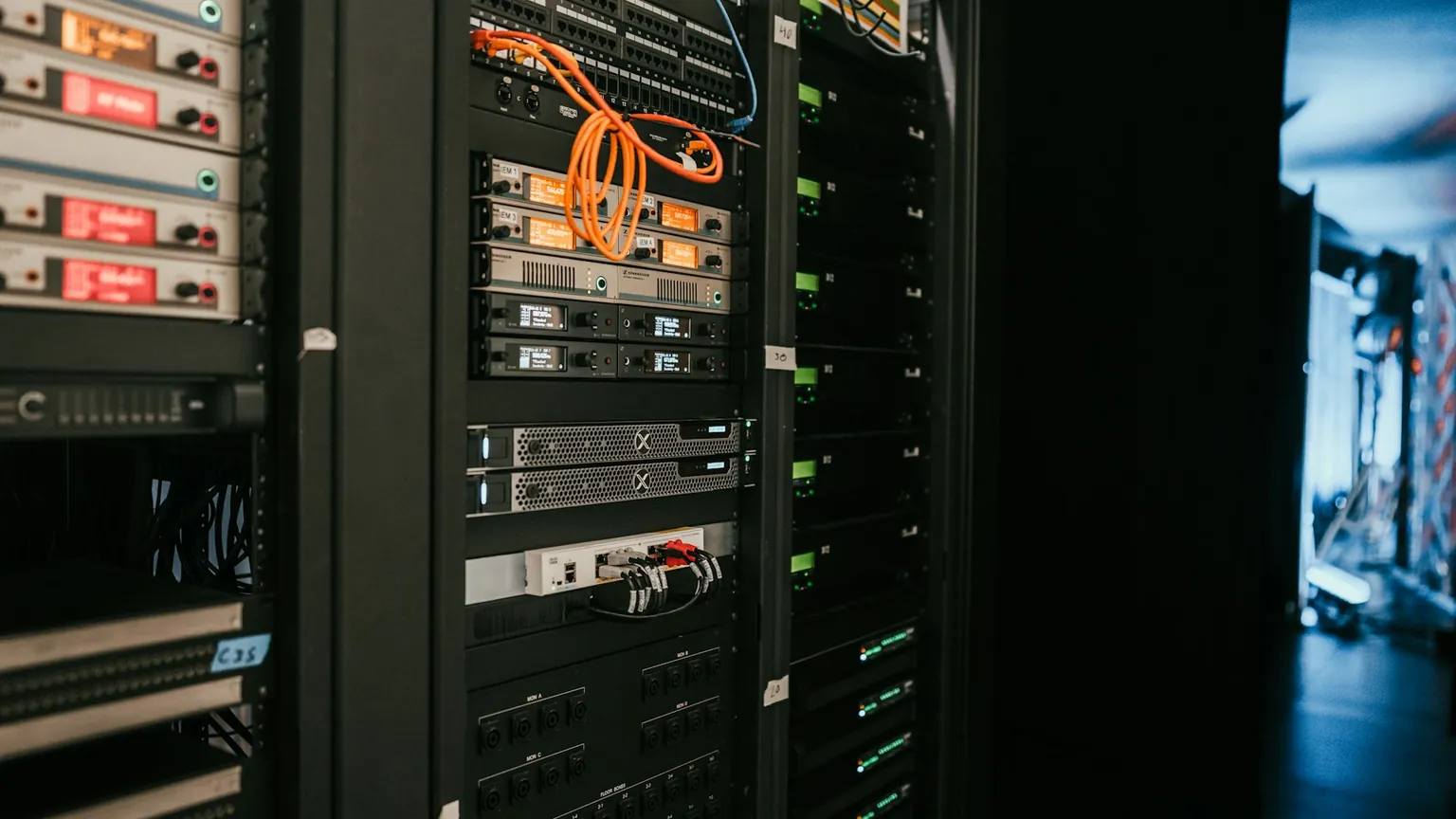 Server equipment and bundled cables in a server room.