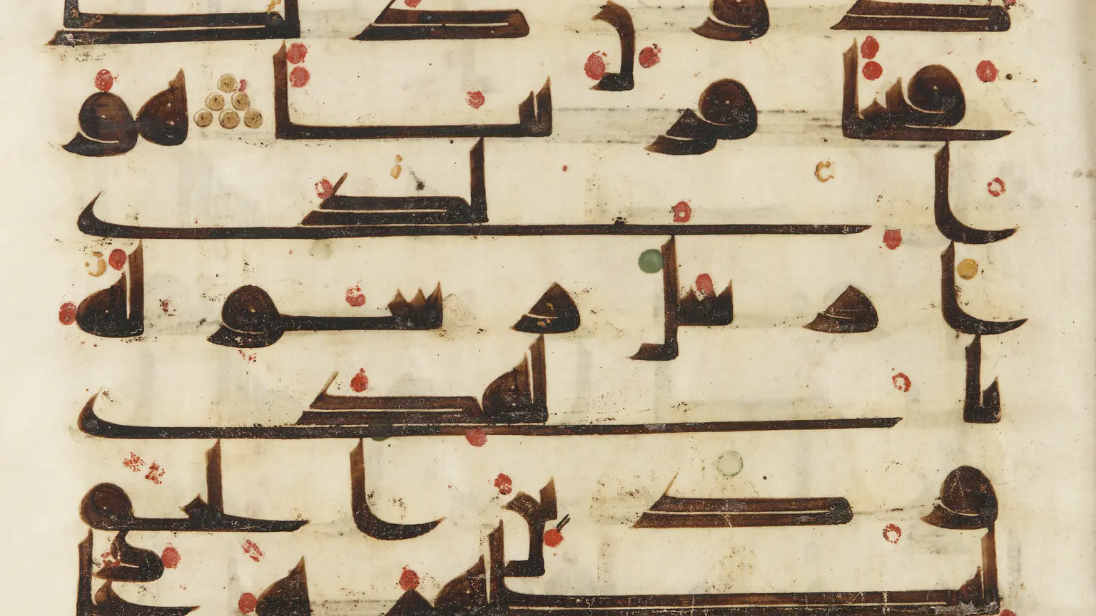 Close view of Arabic Kufic script on an eighth- or ninth-century parchment folio.