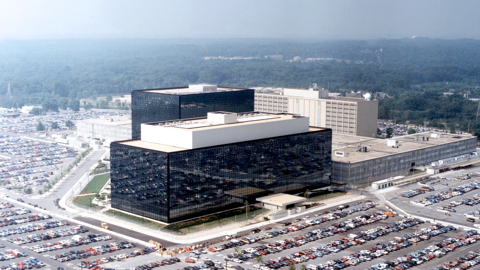 The National Security Agency headquarters buildings at Fort Meade, Maryland, seen across a lawn.