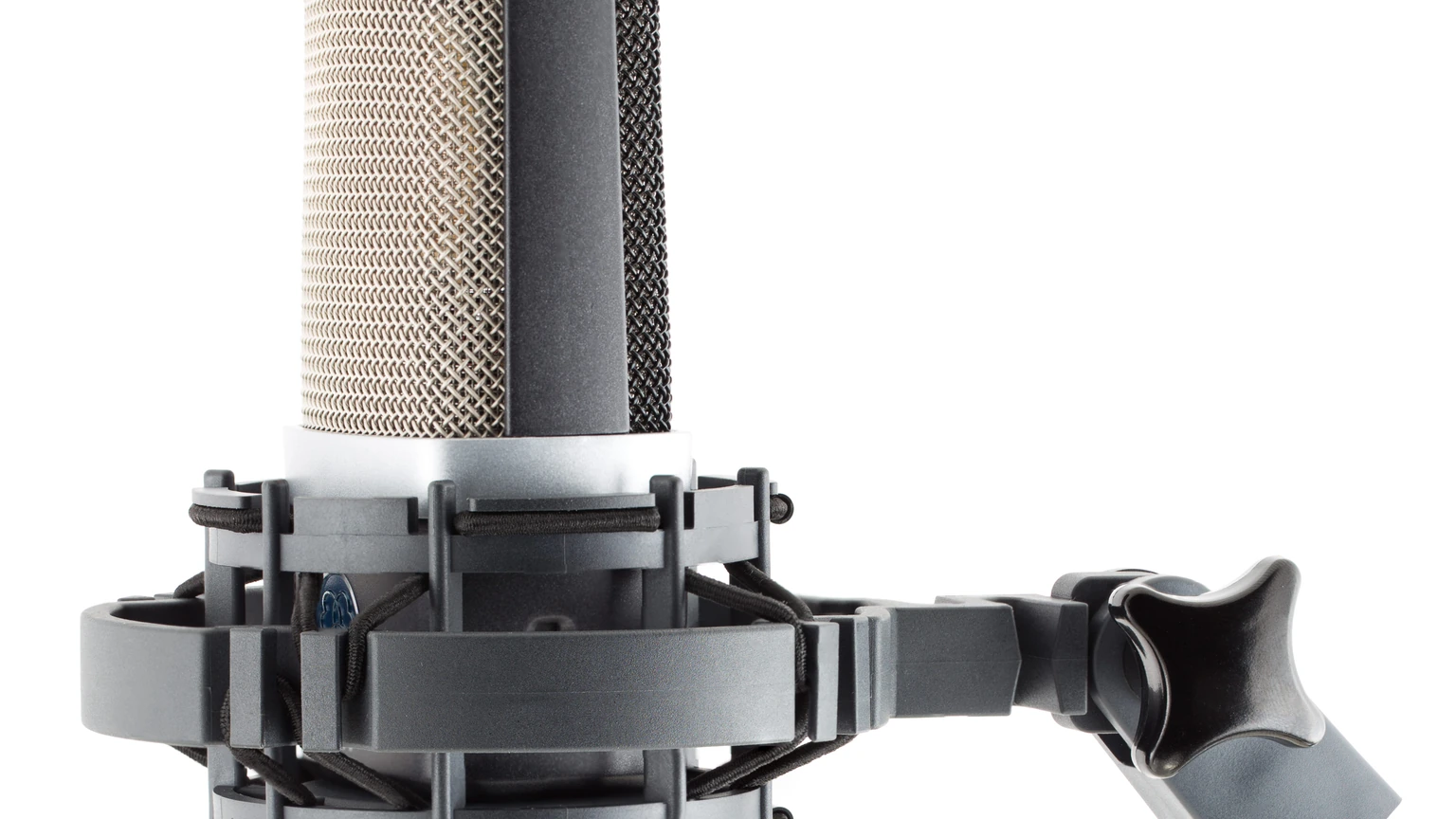 Silver-capsule AKG C214 condenser microphone in a black H85 shock mount against a white background. No people appear.