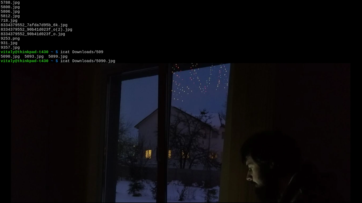 A terminal emulator window rendering a colorful gradient image above a shell prompt. No people appear.