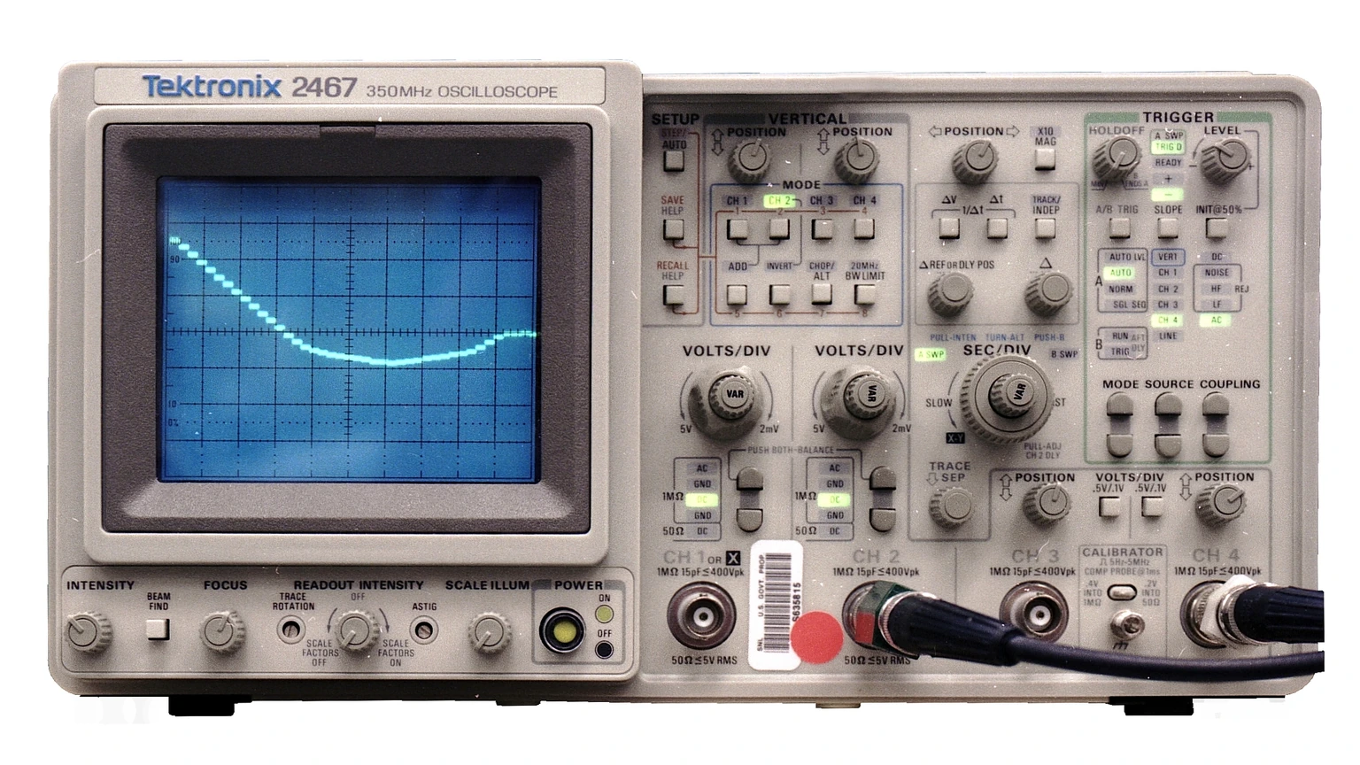 A Tektronix 2467 analog oscilloscope with knobs and a CRT screen. No people appear.