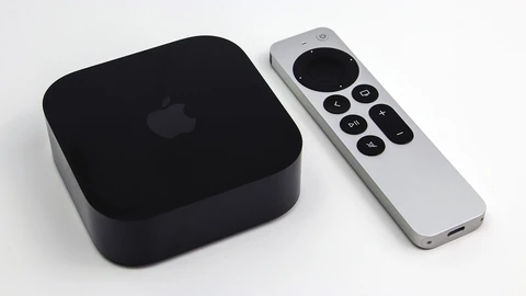 A black, rounded-square Apple TV 4K box with an Apple logo on top, next to a silver Siri Remote, on a plain white background.