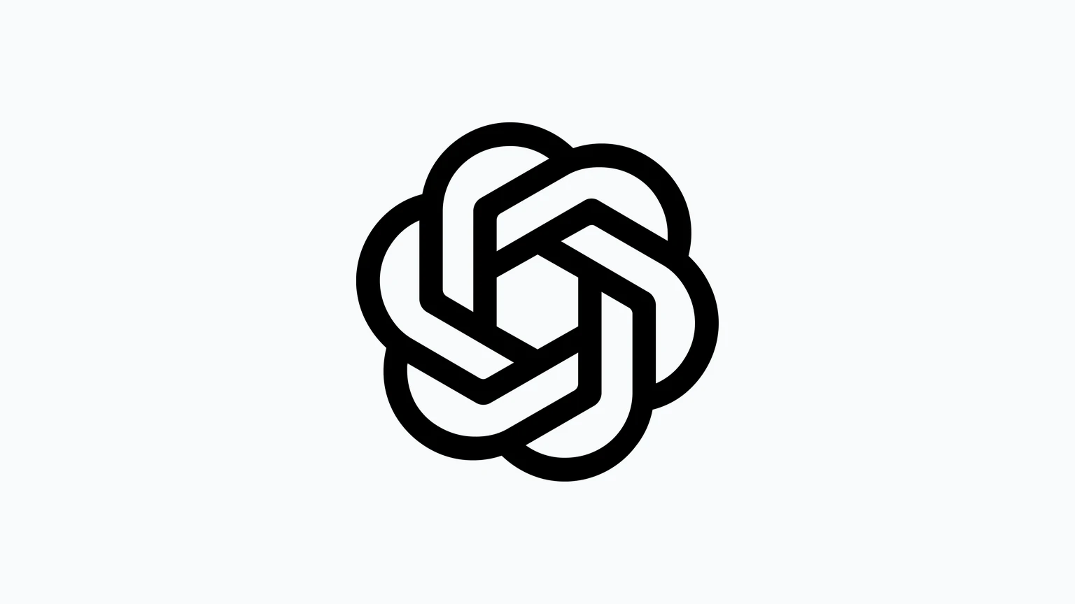 OpenAI’s black blossom logo, a hexagonal knot of interlocking rounded bands, centred on a plain off-white background.