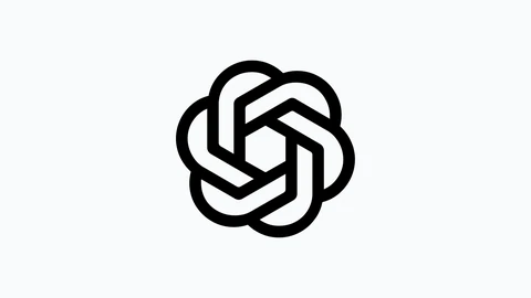 OpenAI’s black blossom logo, a hexagonal knot of interlocking rounded bands, centred on a plain off-white background.