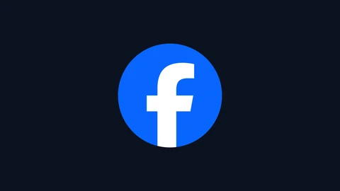Facebook’s white lowercase f inside a solid blue circle, centred on a plain dark navy background.