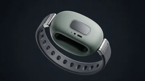 AI-generated illustration of a sage-green pebble-shaped wearable AI module on a dark silicone wristband against a dark charcoal background, with no readable text and no person.
