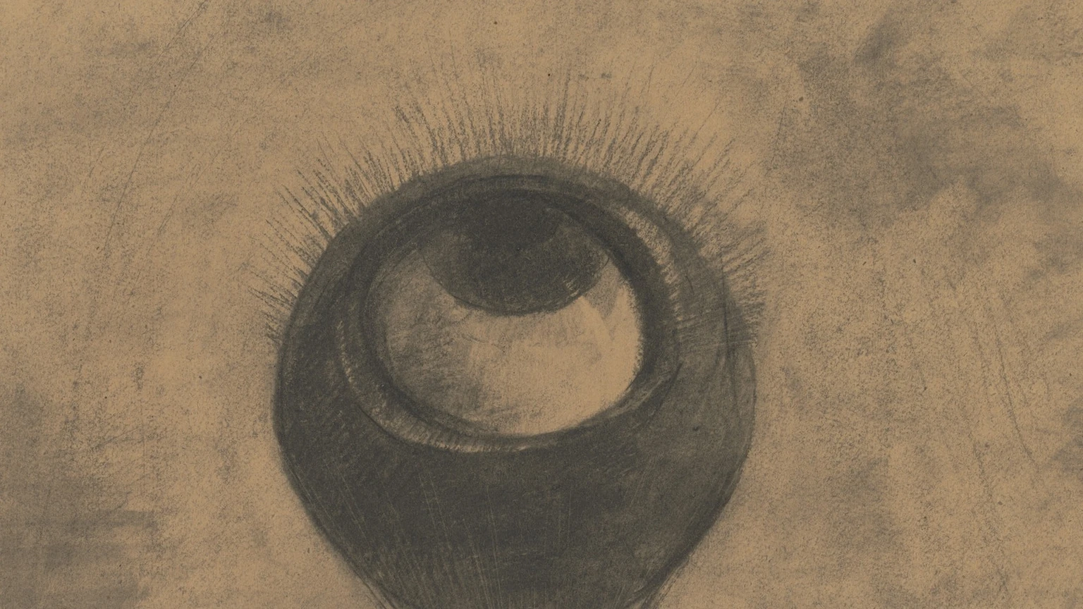 Odilon Redon's 1878 charcoal drawing Eye-Balloon: a huge lashed eye forms the top of a hot-air balloon and gazes upward against a smudged brown sky.