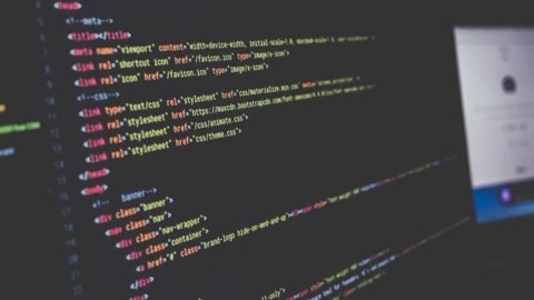 A close photograph of a computer monitor showing CSS code, with no identifiable person and no readable product name.
