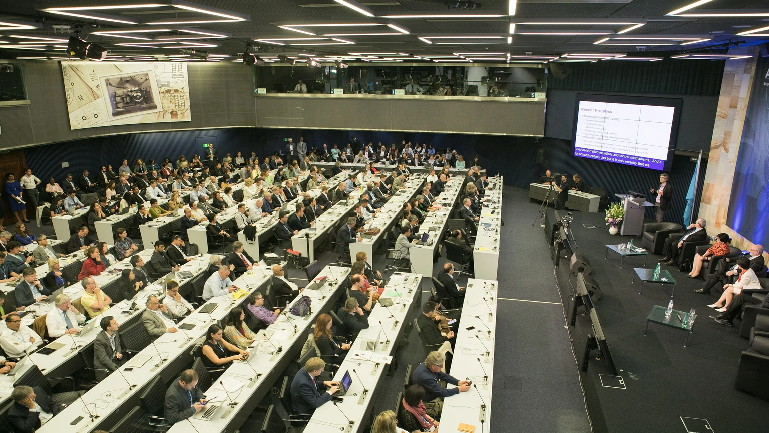 An audience seated in the AI for Good Global Summit conference hall.