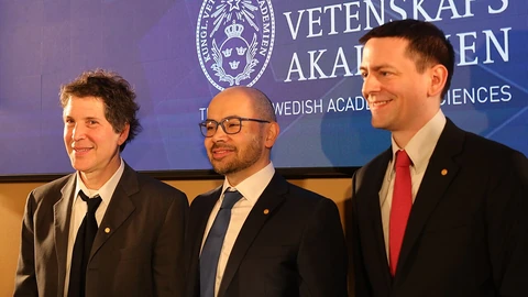 David Baker, Demis Hassabis, and John Jumper at the 2024 Nobel Prize conference. Contextual photograph; not the Claude enzyme study.