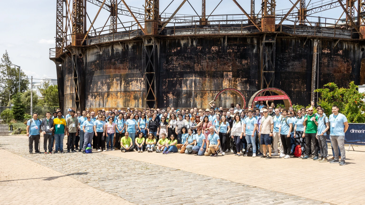 A large group of Wikimedia Hackathon participants outside a building in Athens.