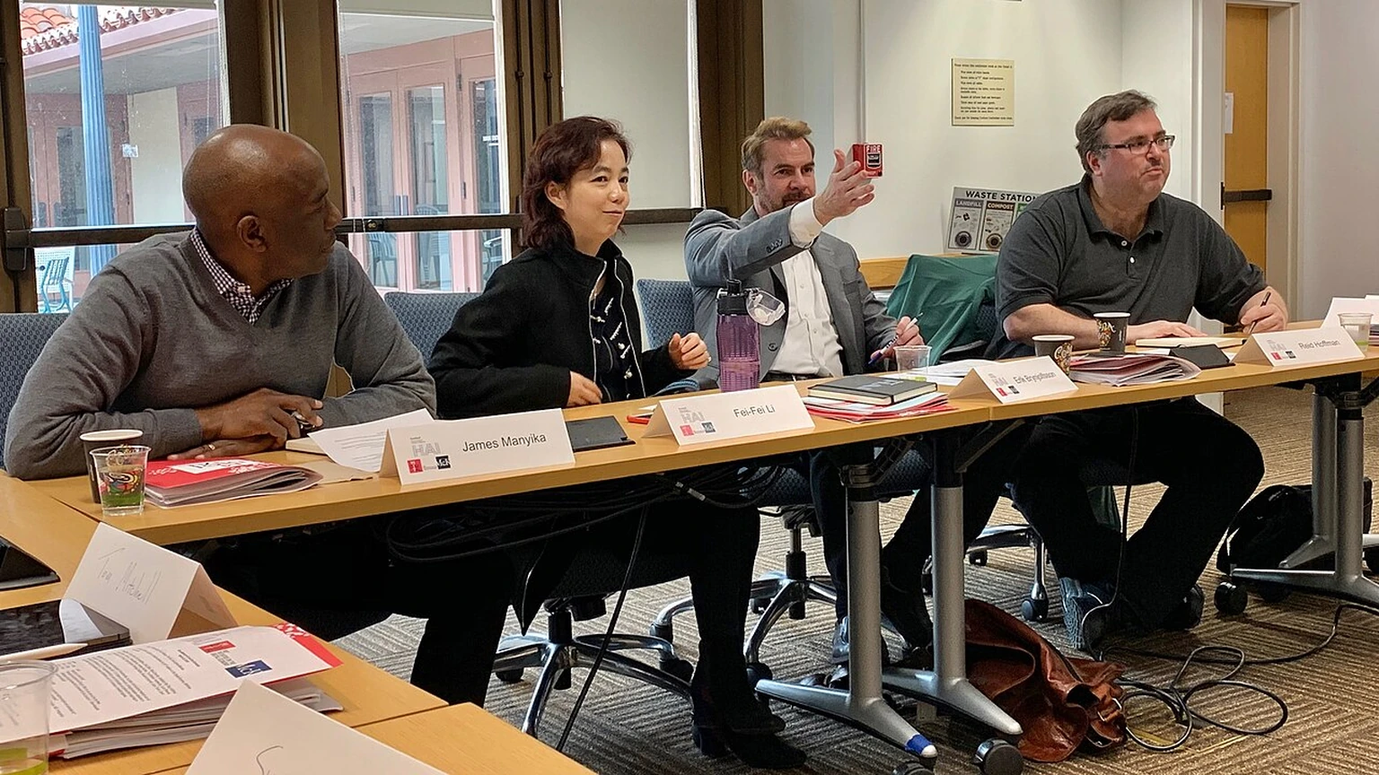 A 2019 roundtable on AI and the economy at Stanford HAI. Archival photograph.