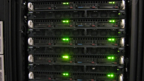 NVIDIA Tesla GPU computing equipment with green status lights.
