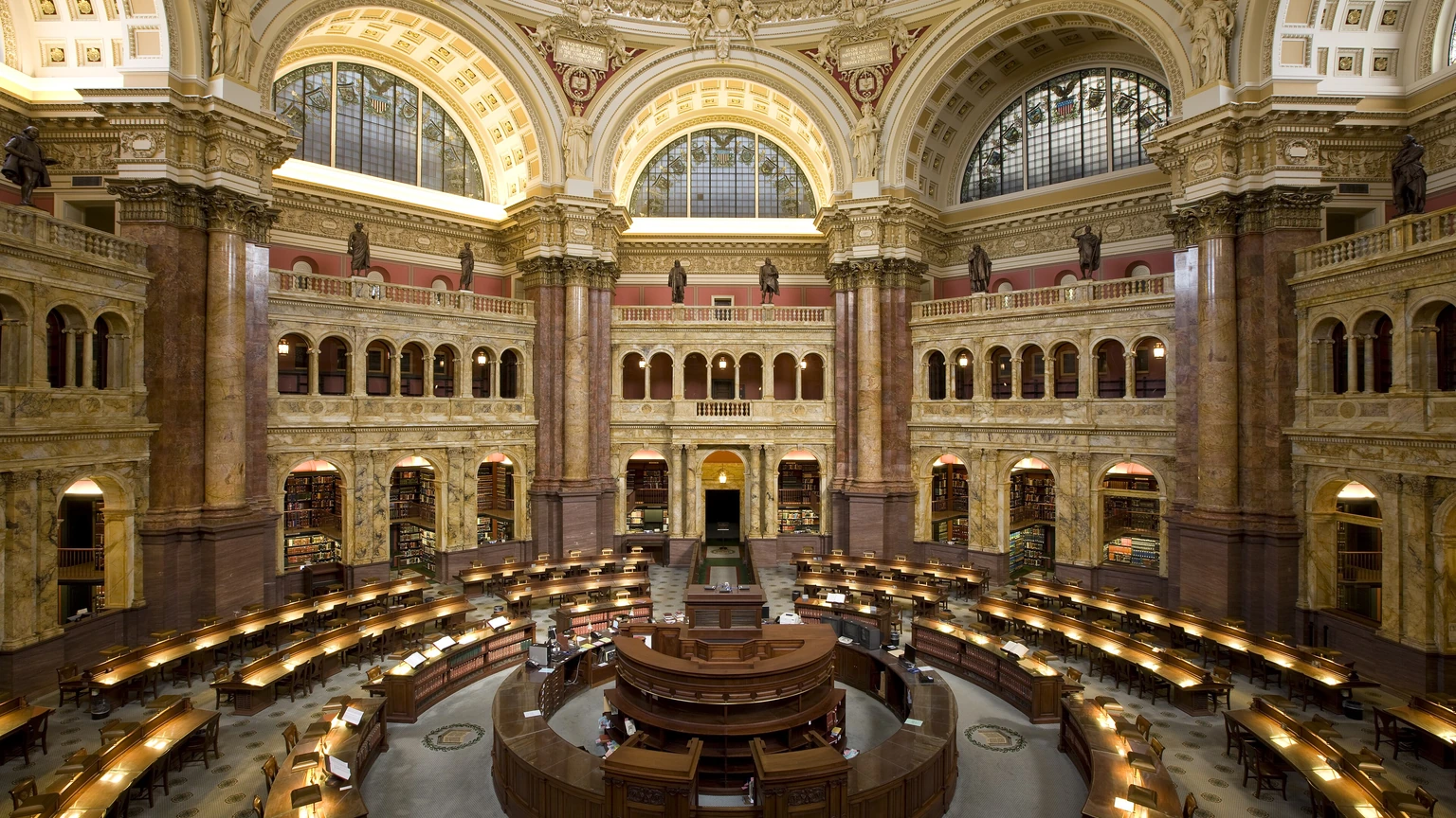 Library of Congress Main Reading Room with research desks under an ornate domed interior.