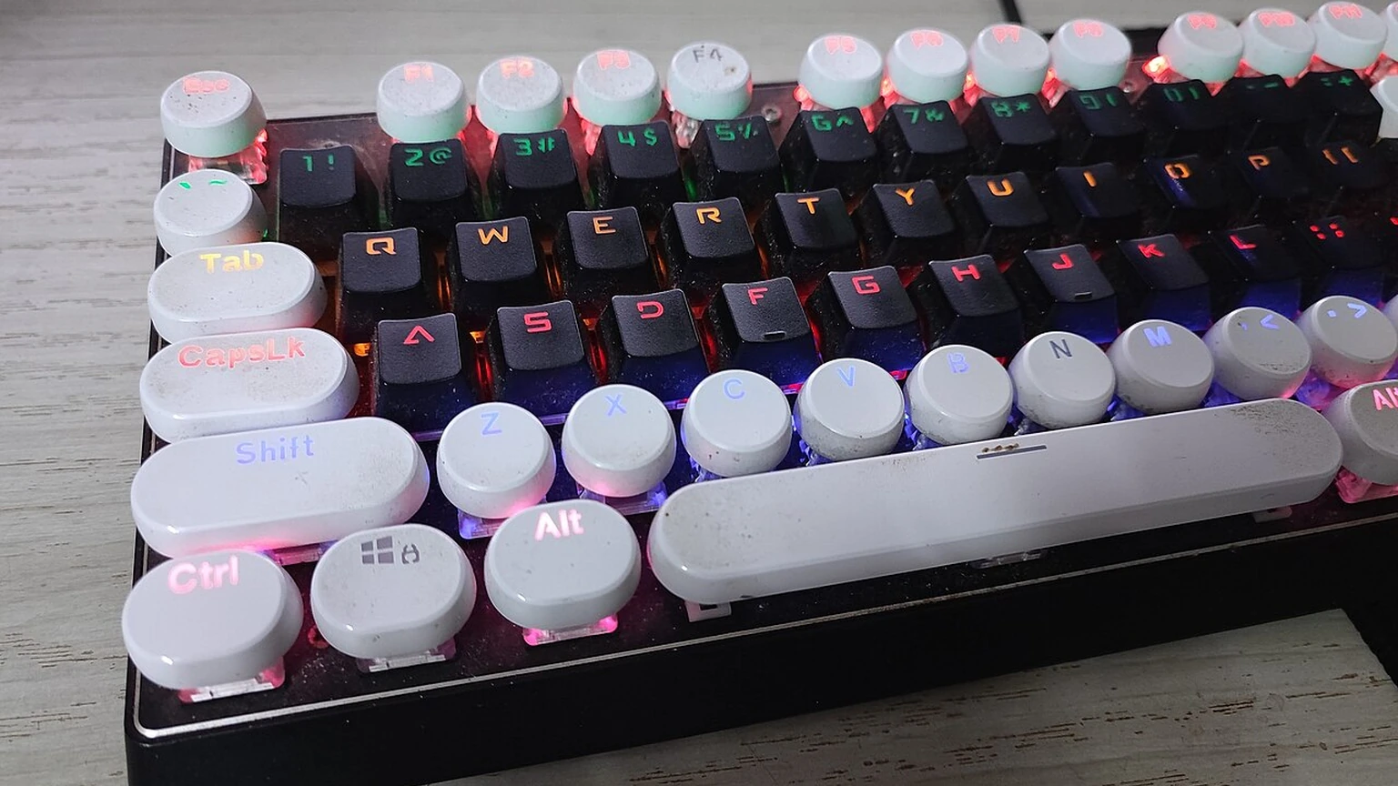 Mechanical keyboard with contrasting black and white keycaps.